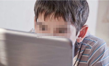 Child in front of computer